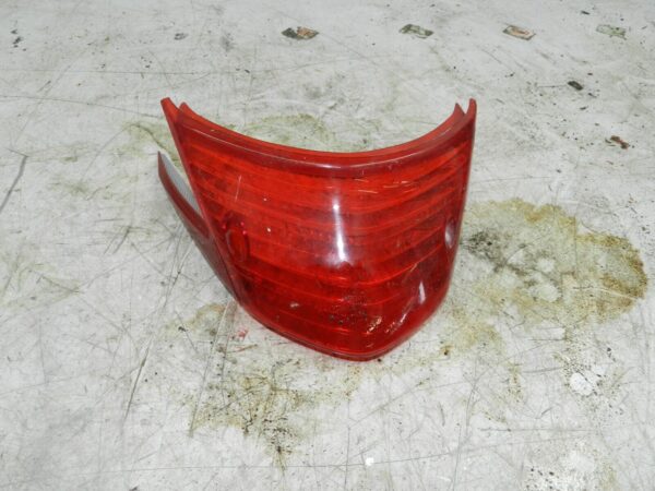 (140) HONDA NSC 110 E-E MOPED.  REAR BRAKE LIGHT LENS