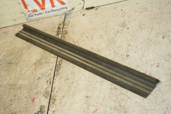 1988 BMW 525 E28. LOWER DOOR KICK TRIM SEAL OFF SIDE FRONT
