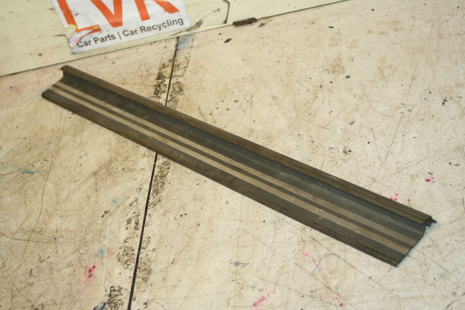 1988 BMW 525 E28. LOWER DOOR KICK TRIM SEAL OFF SIDE FRONT