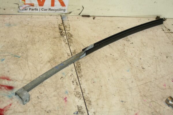 1988 BMW 525 E28. WINDOW DOOR GLASS GUIDE NEAR SIDE REAR
