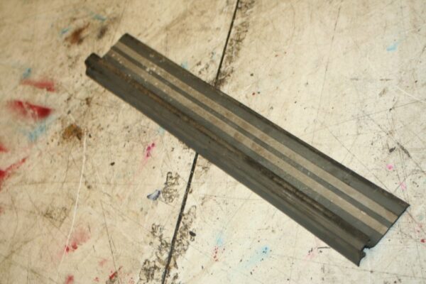 1988 BMW 525 E28. LOWER DOOR KICK TRIM SEAL NEAR SIDE REAR