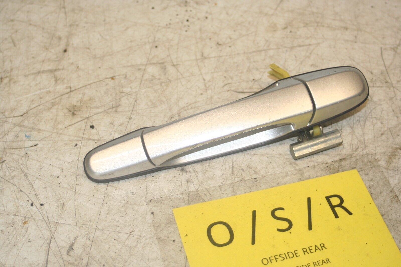 2004 LEXUS IS200. DRIVER SIDE REAR OUTER DOOR HANDLE IN SILVER