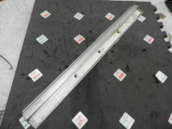 134. 1997-2002 JAGUAR XJ8. DRIVER SIDE FRONT FLOOR SILL TRIM