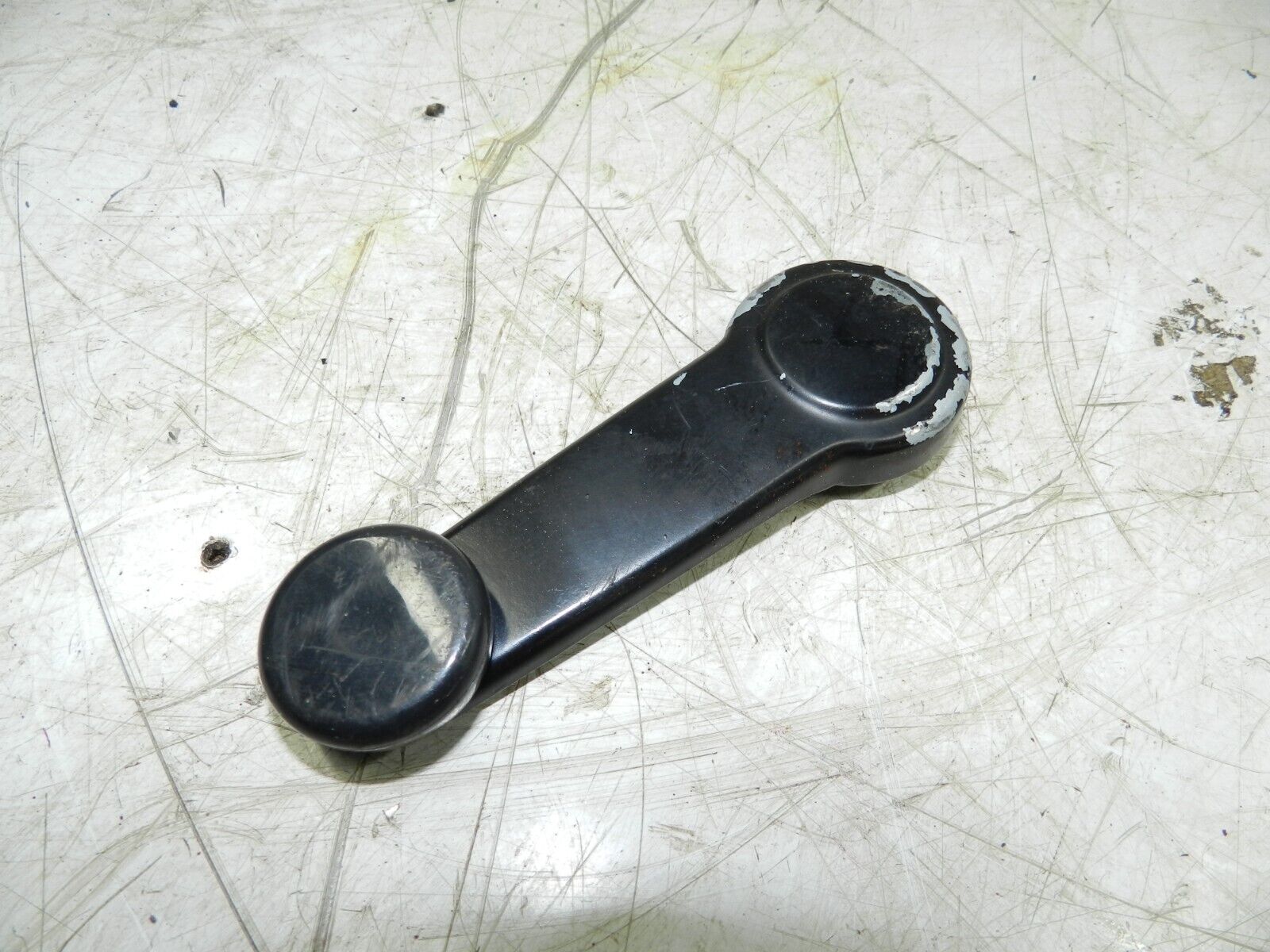 (129) 2005 HONDA JAZZ. REAR MANUAL WINDOW WINDER HANDLE