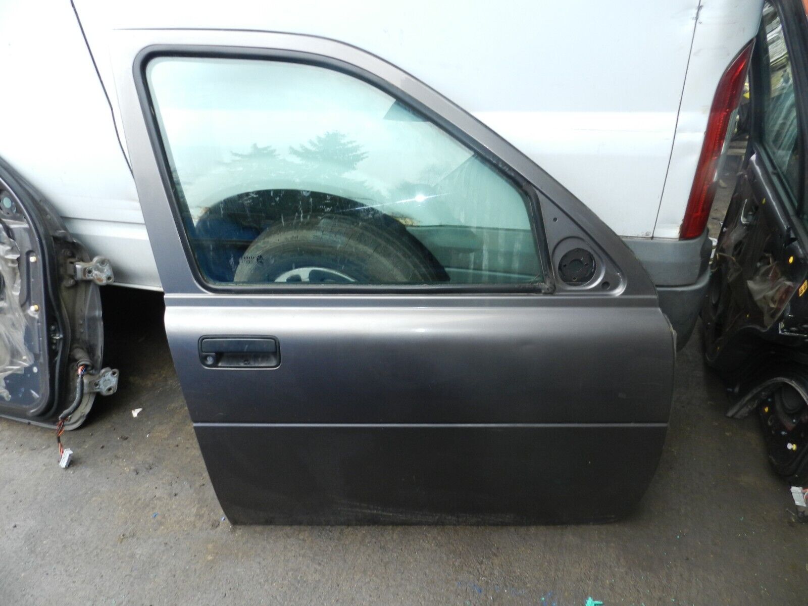 2006 LAND ROVER FREELANDER 1 FACELIFT L314. DRIVER FRONT DOOR IN BONATTI GREY