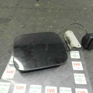 2009 NISSAN QASHQAI J10. FUEL FLAP CAP COVER IN BLACK
