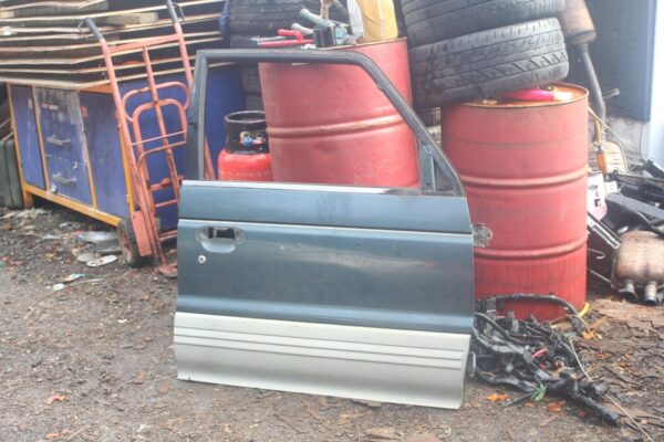 1994 MITSUBISHI PAJERO SHOGUN. DRIVER SIDE FRONT DOOR SHELL BARE