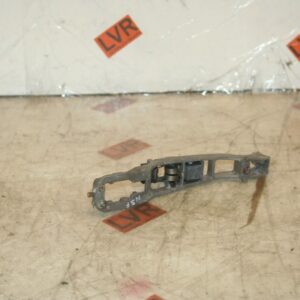 1989 MERCEDES 300E W124. DOOR HANDLE BRACKET PASSENGER SIDE FRONT