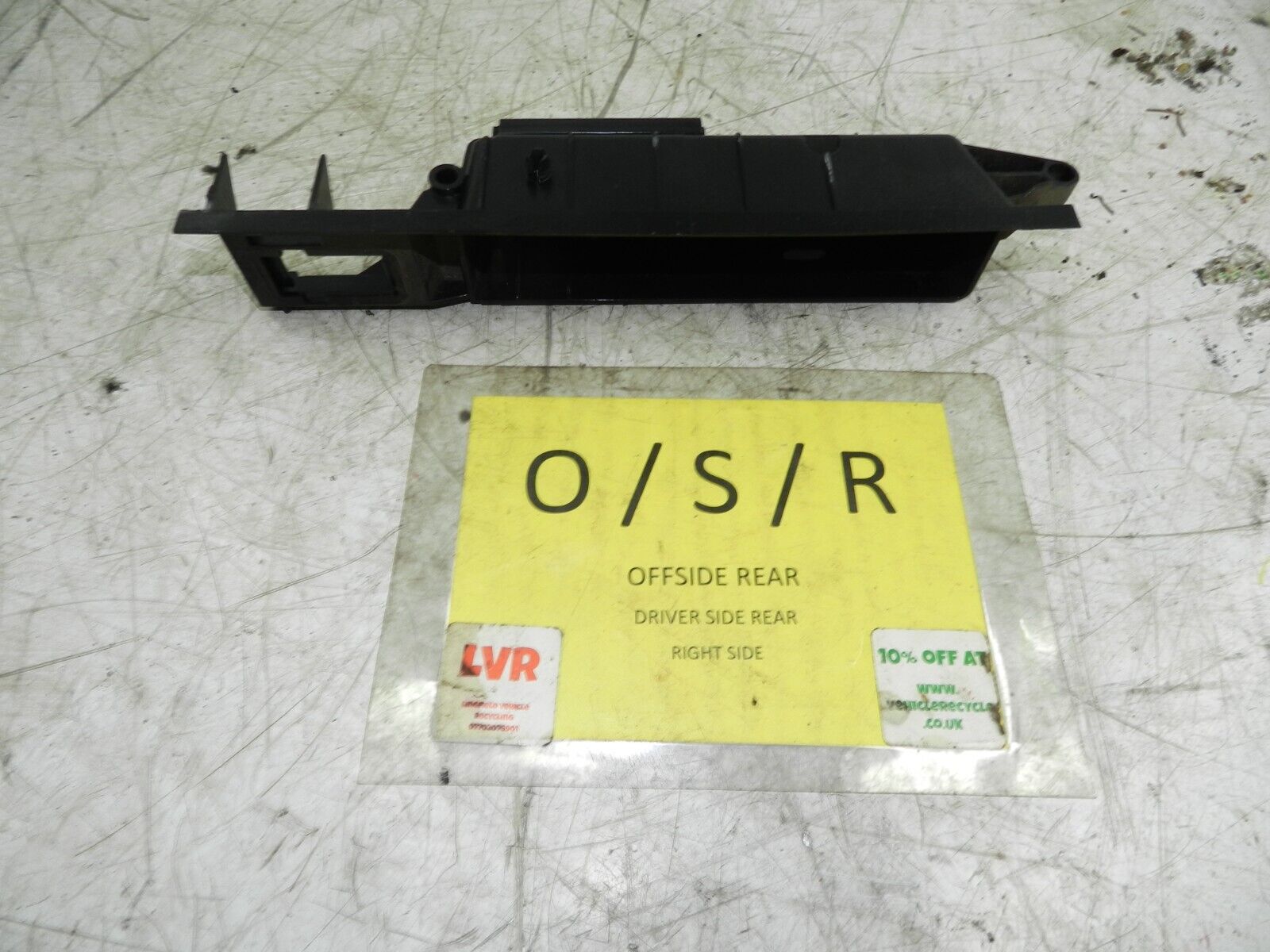 1990 VOLVO 700 740. DRIVER SIDE REAR DOOR HANDLE FRAME