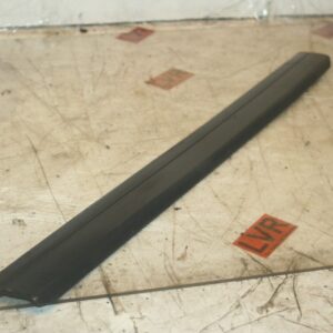 1989 MERCEDES 300E W124. PASSENGER SIDE REAR DOOR TRIM LOWER