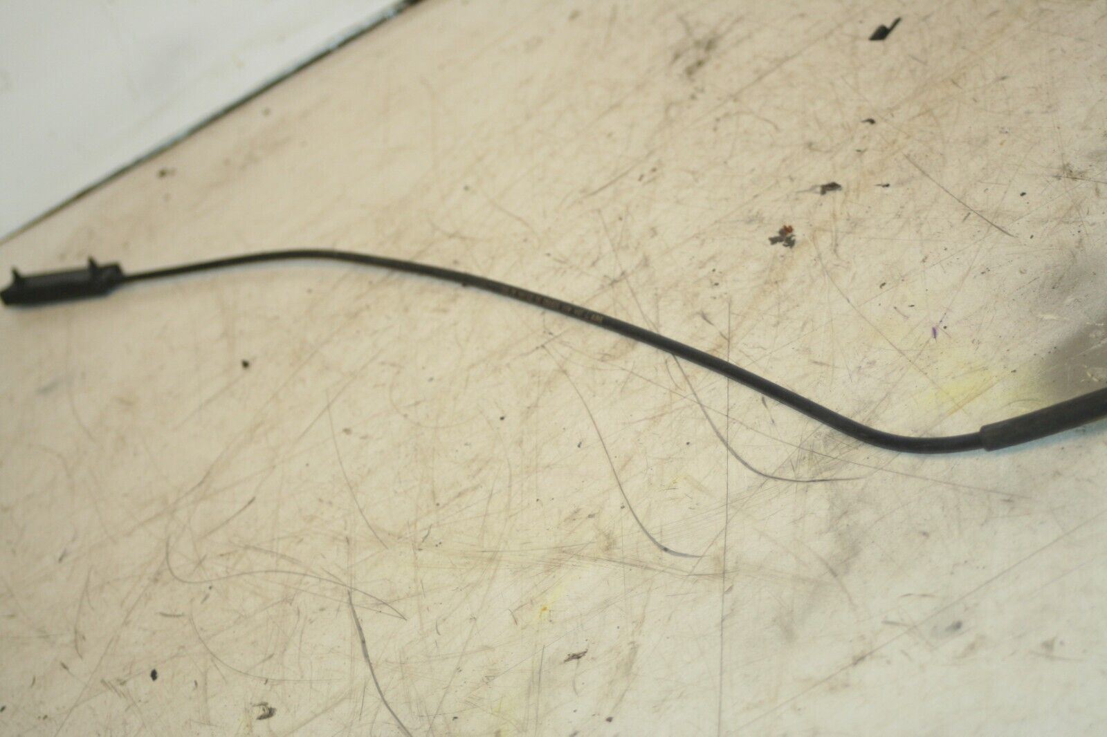 (95) 2010 BMW 1 SERIES E82. BONNET RELEASE CABLE