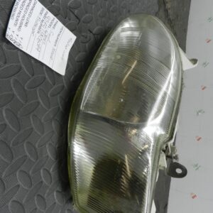 (H0010) INSURANCE HEADLIGHT FORD ESCORT PASSENGER SIDE 95AG13K060BA *DAMAGED*