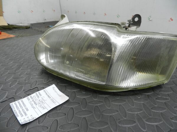 (H0010) INSURANCE HEADLIGHT FORD ESCORT PASSENGER SIDE 95AG13K060BA *DAMAGED* - Image 3