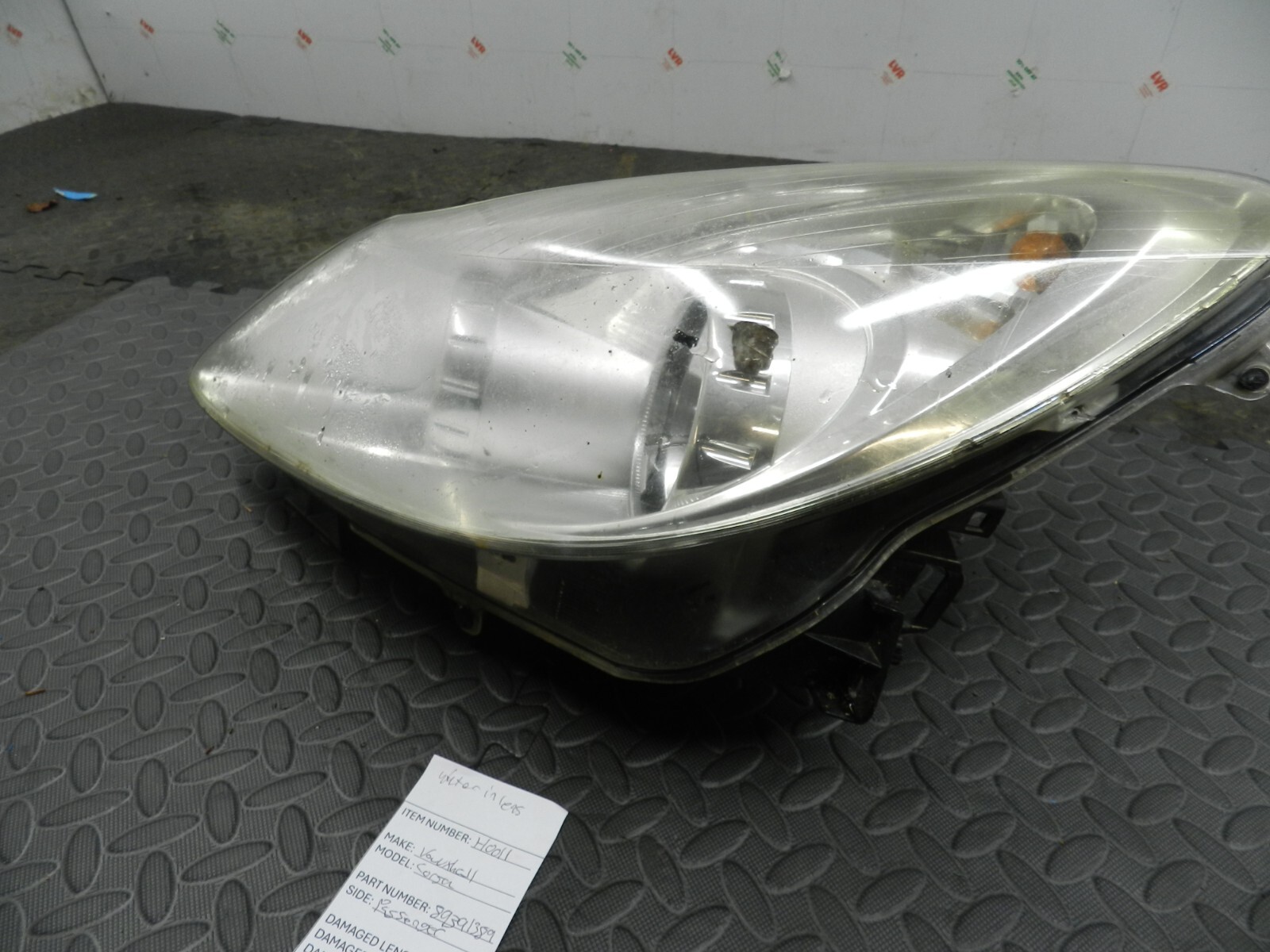 (H0011) INSURANCE HEADLIGHT VAUXHALL CORSA PASSENGER SIDE 89391389 *DAMAGED*