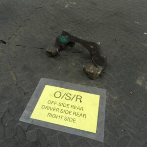157. 1997 BMW 323I E36 CONVERTIBLE. DRIVER SIDE REAR BRAKE CARRIER
