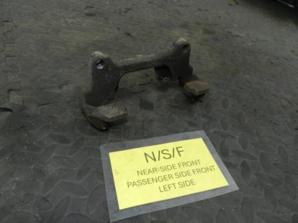 161, 2008 VOLKSWAGEN PASSAT B6 ESTATE. PASSENGER SIDE FRONT BRAKE CARRIER