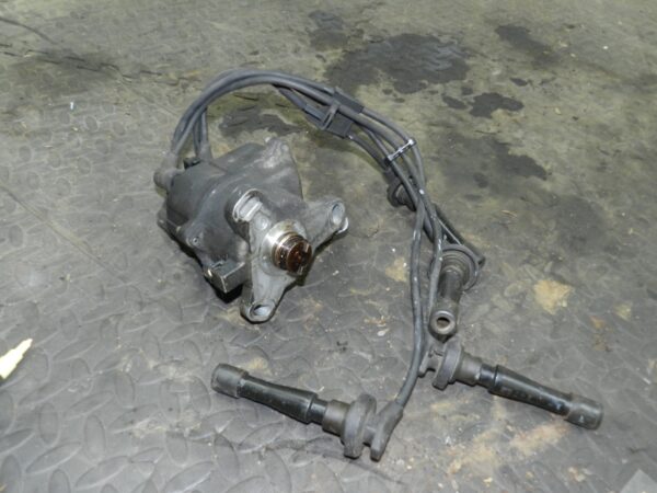 162. 1996 HONDA SMX. IGNITION COIL PACK AND HT LEADS DISTRIBUTOR