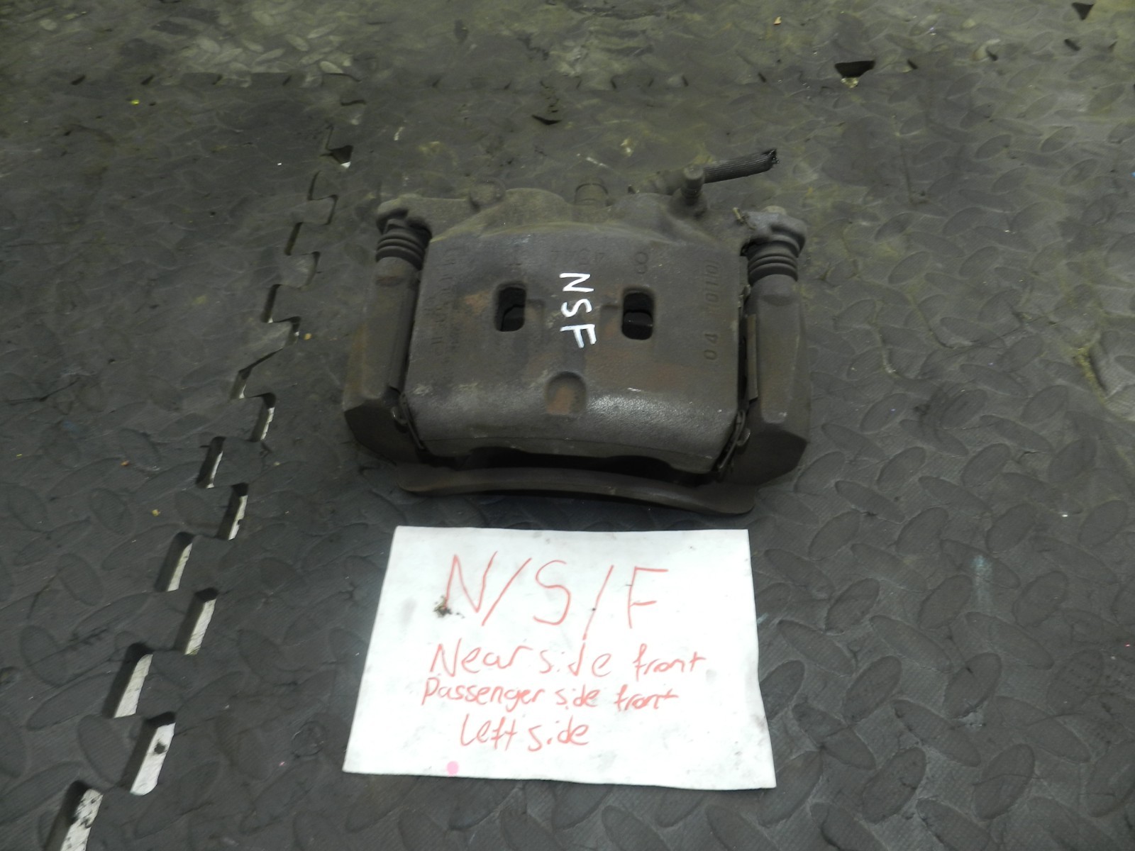 180. 2018 RENAULT KOLEOS MK2. PASSENGER SIDE FRONT BRAKE CALIPER + CARRIER