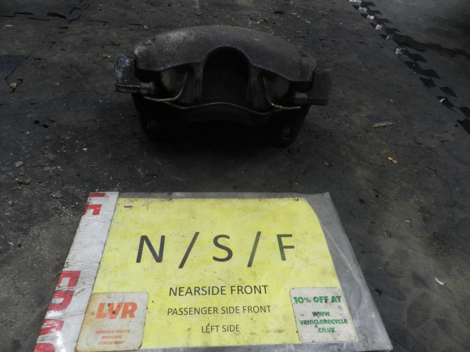 183. 2006 AUDI A4 CONVERTIBLE B7. PASSENGER SIDE FRONT BRAKE CALIPER + CARRIER