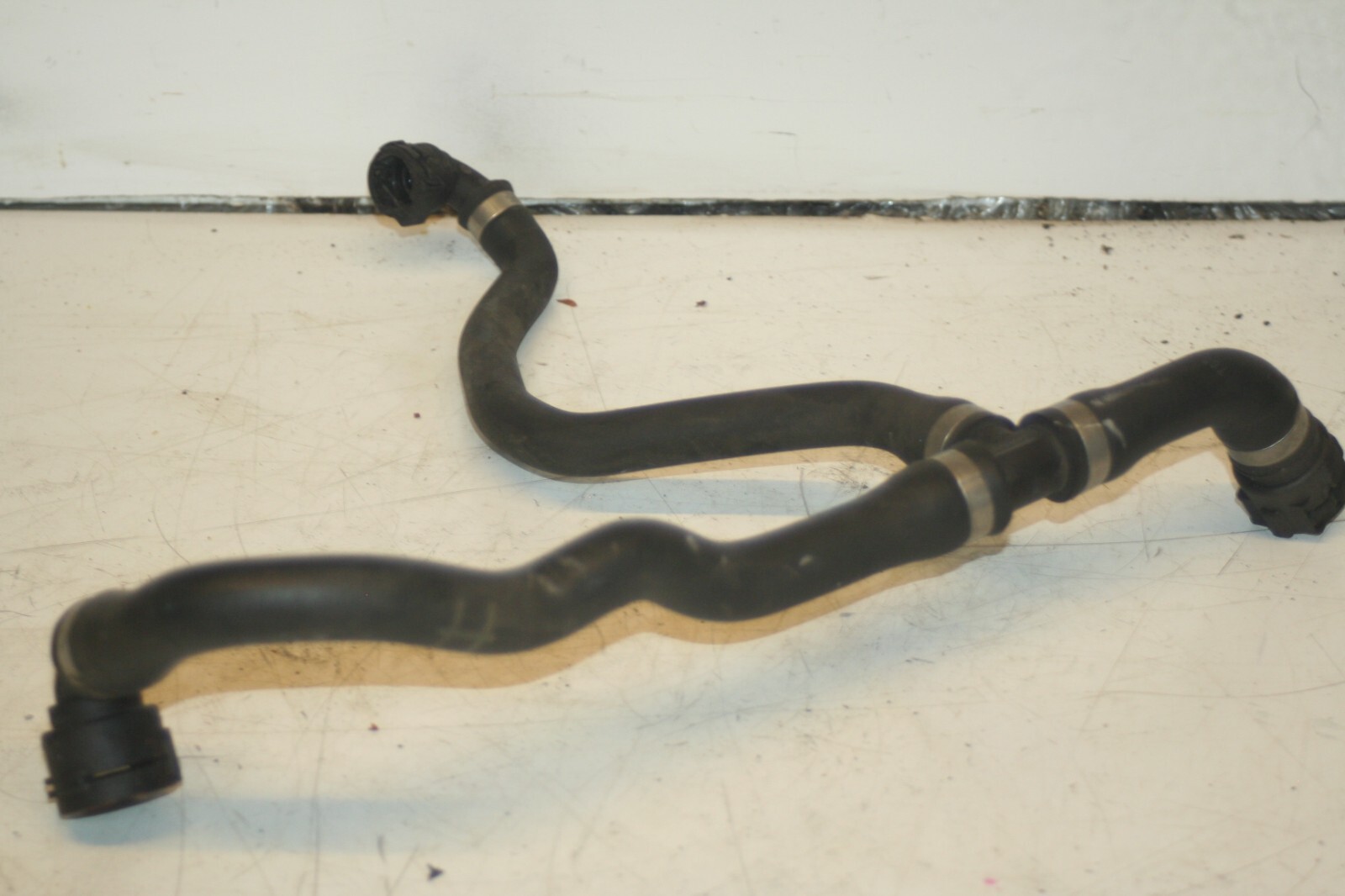 (95) 2010 BMW 1 SERIES E82. COOLANT PIPES